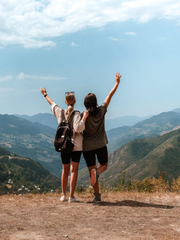 Travel. Girl travels through the mountains glamping, tents,waterfalls of wild nature. Unity, mental health, eco travel. Hiking in the mountains, van life vibes, travelling,good moments, digital detox